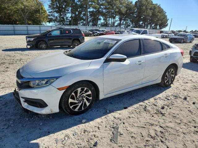 HONDA CIVIC 2018 with VIN 19XFC2F75JE038012 - Photo from auction