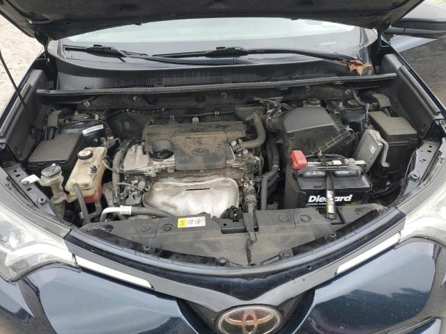 Photo 12 from auction – 2018 TOYOTA RAV4 LE with VIN JTMBFREV0JJ730471