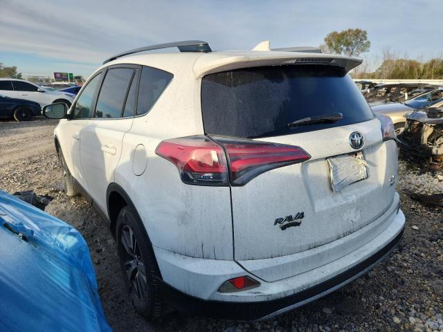 Photo 2 from auction – 2017 TOYOTA RAV4 XLE with VIN JTMRFREV0HJ144362