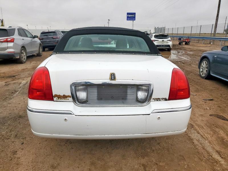 Photo 6 from auction – 2003 LINCOLN TOWN CAR with VIN 1LNHM82W23Y628490