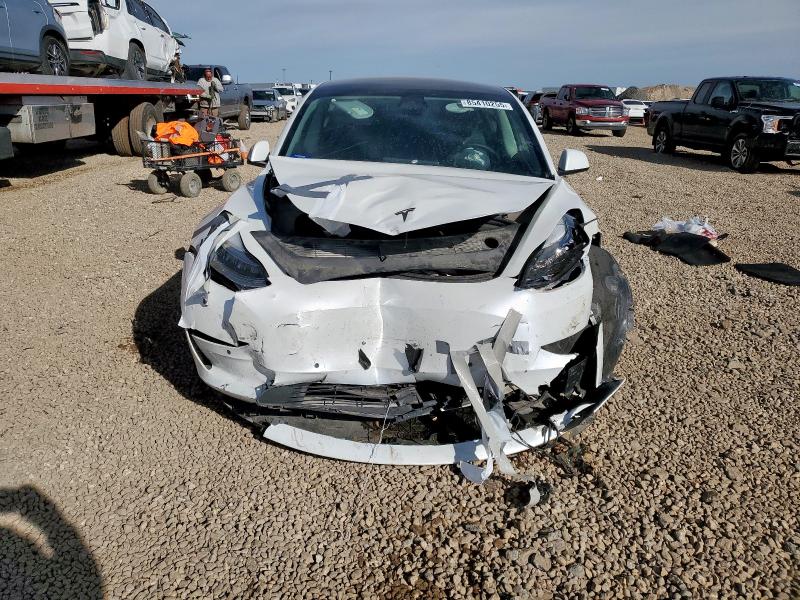 Photo 5 from auction – 2022 TESLA MODEL 3 with VIN 5YJ3E1EB3NF298423