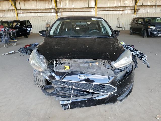 Photo 5 from auction – 2016 FORD FOCUS SE with VIN 1FADP3K21GL395754