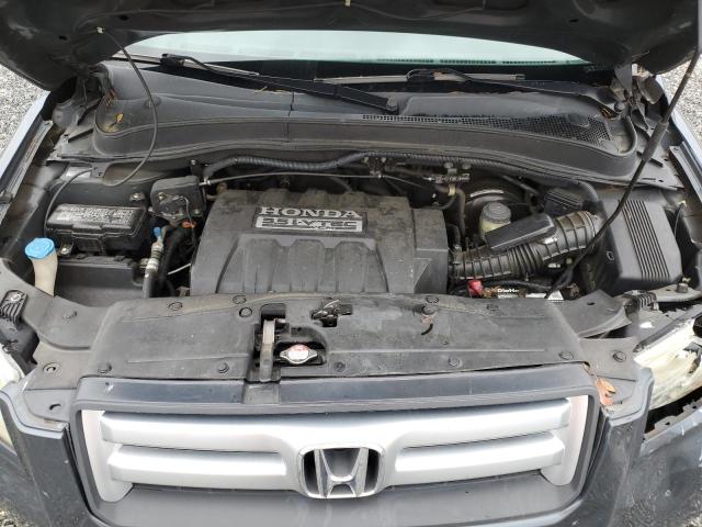 Photo 12 from auction – 2006 HONDA PILOT EX with VIN 5FNYF28446B044338
