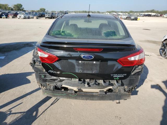 Photo 6 from auction – 2014 FORD FOCUS TITANIUM with VIN 1FADP3J2XEL161594