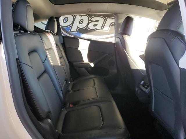 Photo 10 from auction – 2023 TESLA MODEL Y with VIN 7SAYGDEF4PF841577