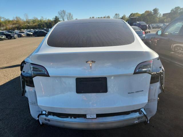 Photo 6 from auction – 2023 TESLA MODEL Y with VIN 7SAYGDEE0PA114358