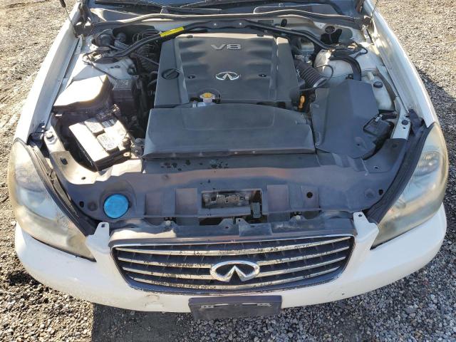 Photo 11 from auction – 2003 INFINITI Q45 with VIN JNKBF01AX3M102013