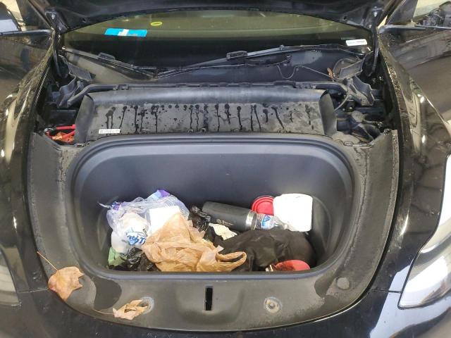 Photo 12 from auction – 2023 TESLA MODEL Y with VIN 7SAYGDEE1PA184032