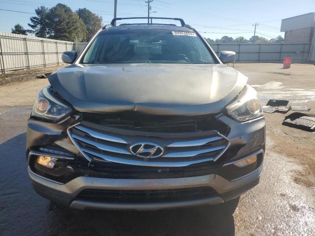 Photo 5 from auction – 2017 HYUNDAI SANTA FE S with VIN 5NMZU3LB4HH047182