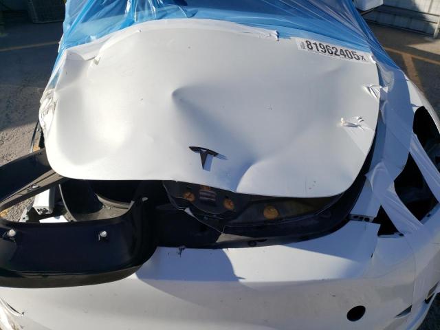 Photo 11 from auction – 2023 TESLA MODEL Y with VIN 7SAYGDEFXPF698750
