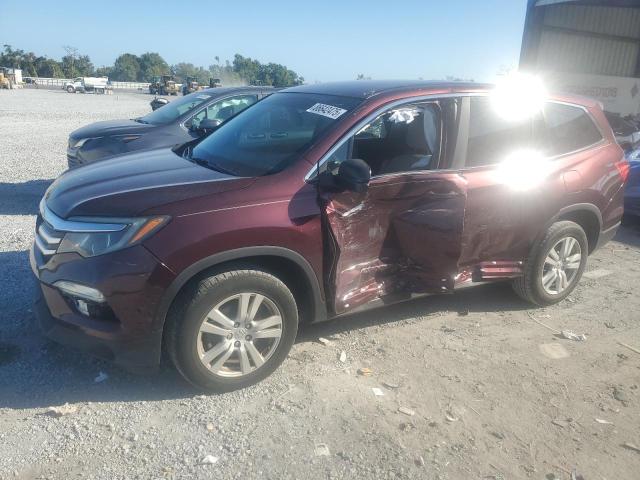 HONDA PILOT LX 2017 with VIN 5FNYF5H11HB023568 - Photo from auction
