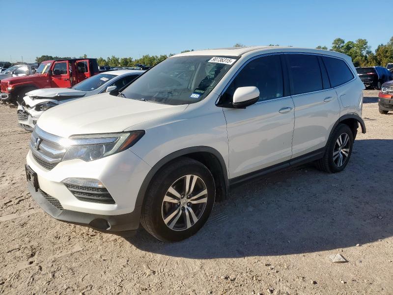 HONDA PILOT EXL 2018 with VIN 5FNYF5H53JB014086 - Photo from auction