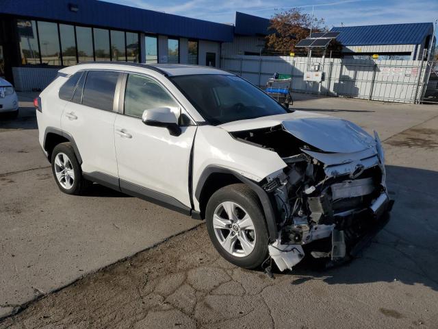 Photo 4 from auction – 2020 TOYOTA RAV4 XLE with VIN JTMP1RFV0LD047819