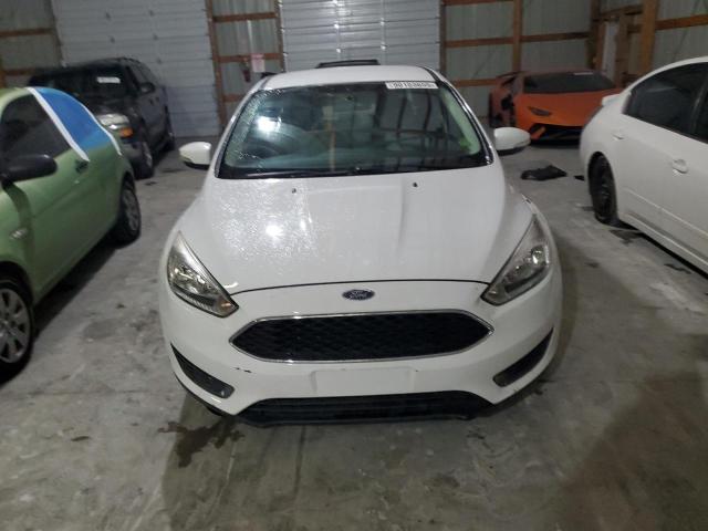 Photo 5 from auction – 2016 FORD FOCUS SE with VIN 1FADP3F24GL355095