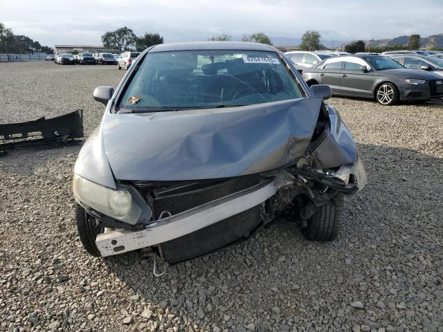 Photo 5 from auction – 2011 HONDA CIVIC LX with VIN 19XFA1F5XBE040192