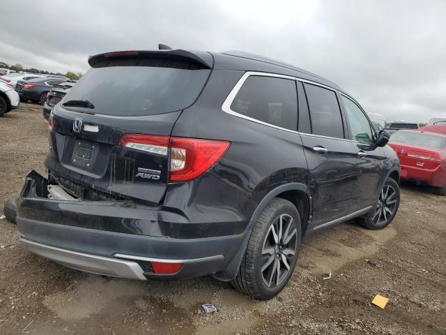 Photo 3 from auction – 2022 HONDA PILOT TOUR with VIN 5FNYF6H91NB016319