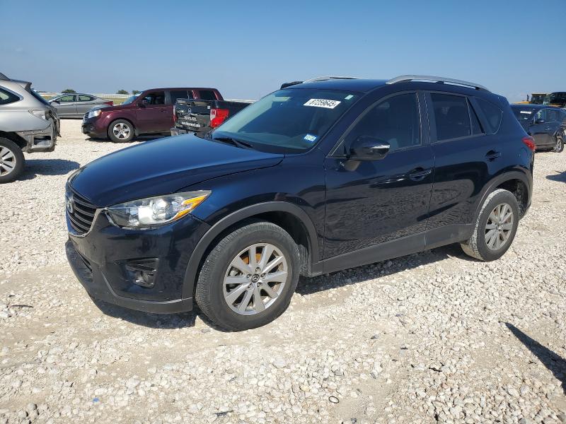 MAZDA CX-5 TOURI 2016 with VIN JM3KE2CY4G0863800 - Photo from auction