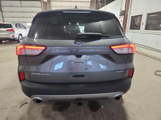 Photo 6 from auction – 2021 FORD ESCAPE TIT with VIN 1FMCU9J90MUA15000