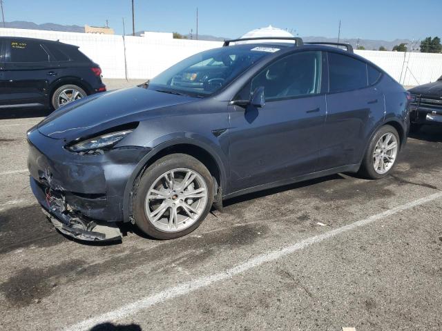 TESLA MODEL Y 2023 with VIN 7SAYGDEE9PA085054 - Photo from auction