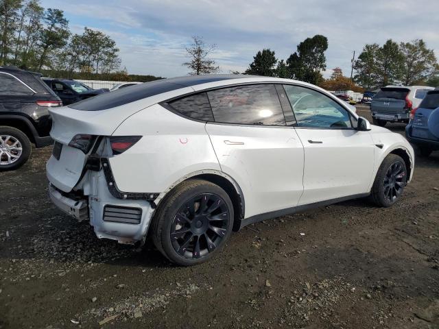 Photo 3 from auction – 2023 TESLA MODEL Y with VIN 7SAYGAEE4PF856070