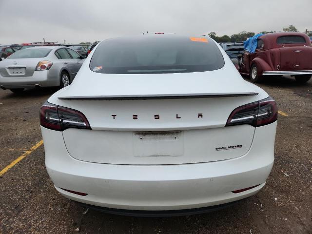 Photo 6 from auction – 2021 TESLA MODEL 3 with VIN 5YJ3E1EC8MF856435