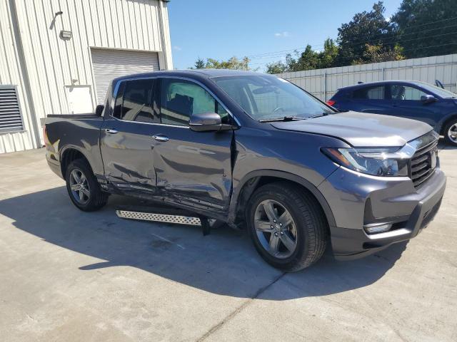 Photo 4 from auction – 2022 HONDA RIDGELINE with VIN 5FPYK3F73NB007012