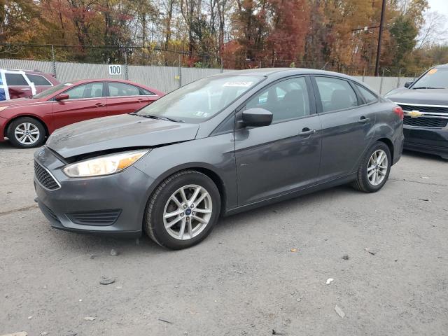 FORD FOCUS SE 2018 with VIN 1FADP3FE7JL306930 - Photo from auction