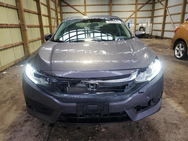 Photo 5 from auction – 2018 HONDA CIVIC LX with VIN 2HGFC2F65JH039156