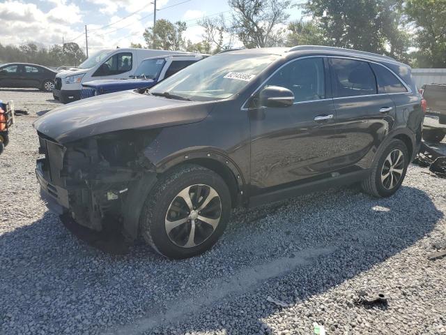 KIA SORENTO EX 2017 with VIN 5XYPH4A57HG201165 - Photo from auction