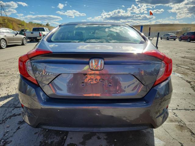 Photo 6 from auction – 2018 HONDA CIVIC LX with VIN 2HGFC2F57JH502034
