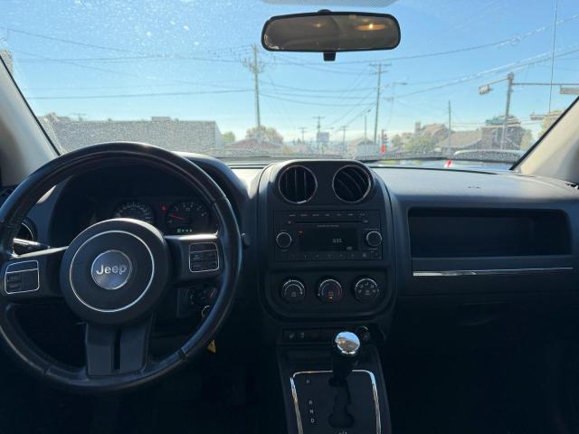 Photo 9 from auction – 2012 JEEP COMPASS with VIN 1C4NJCAB7CD672705