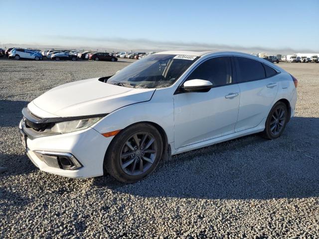 HONDA CIVIC EX 2019 with VIN 19XFC1F31KE214630 - Photo from auction