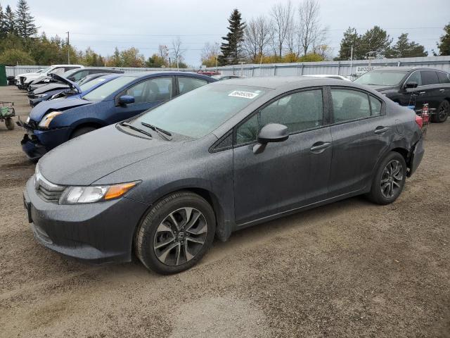 HONDA CIVIC LX 2012 with VIN 2HGFB2F42CH117557 - Photo from auction