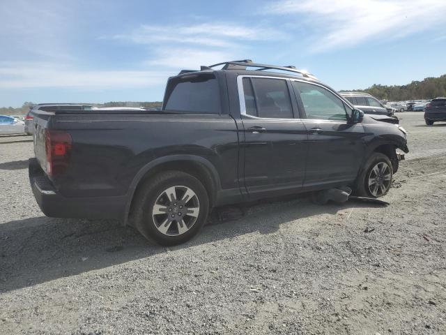 Photo 3 from auction – 2017 HONDA RIDGELINE with VIN 5FPYK3F52HB037525