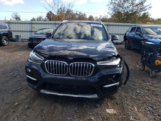 Photo 5 from auction – 2017 BMW X1 with VIN WBXHT3Z33H4A56940