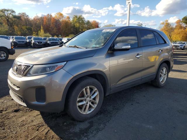 KIA SORENTO 2015 with VIN 5XYKTCA67FG560332 - Photo from auction