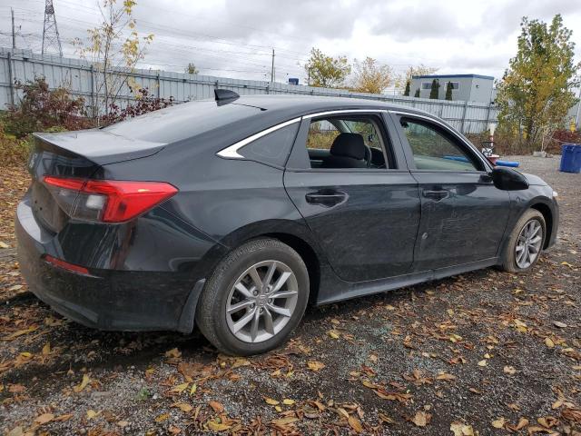 Photo 3 from auction – 2023 HONDA CIVIC EX with VIN 2HGFE2F36PH110549
