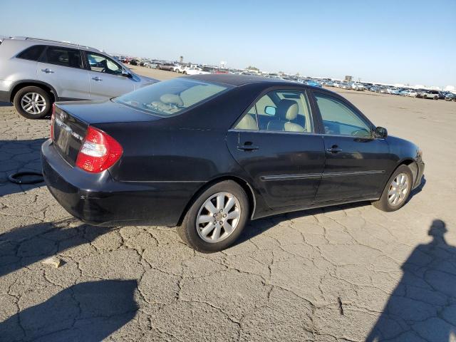 Photo 3 from auction – 2002 TOYOTA CAMRY LE with VIN JTDBE32K620127798