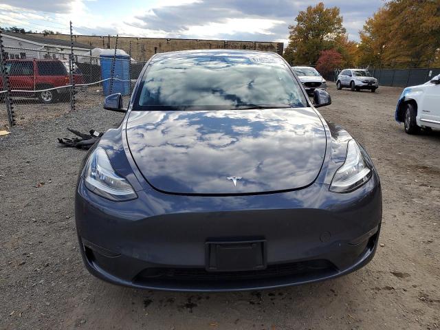 Photo 5 from auction – 2023 TESLA MODEL Y with VIN 7SAYGDEE9PA045993