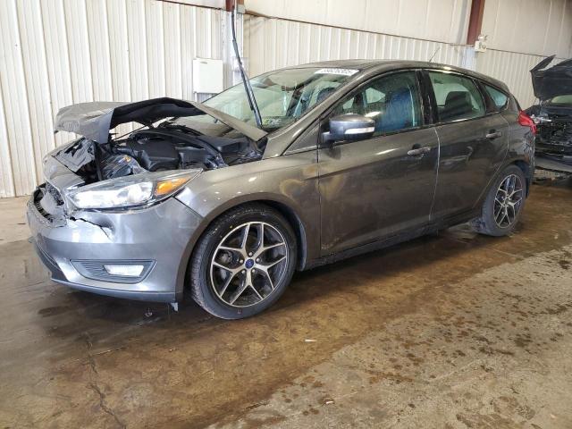 FORD FOCUS SEL 2017 with VIN 1FADP3M21HL305713 - Photo from auction