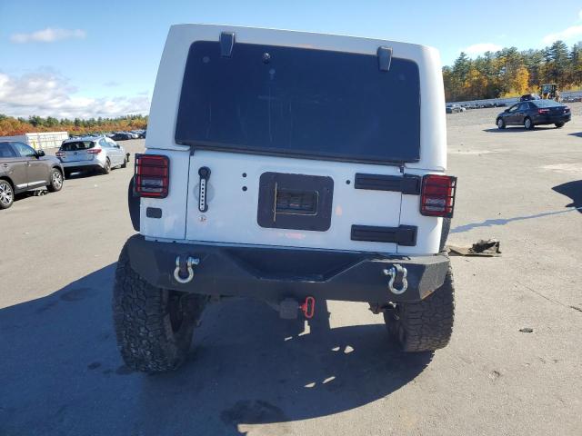Photo 6 from auction – 2014 JEEP WRANGLER U with VIN 1C4BJWFG5EL151239