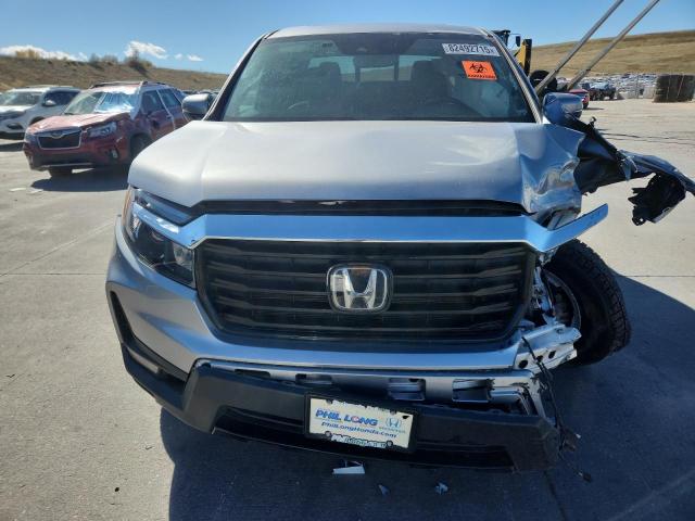 Photo 5 from auction – 2023 HONDA RIDGELINE with VIN 5FPYK3F76PB021991