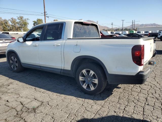 Photo 2 from auction – 2017 HONDA RIDGELINE with VIN 5FPYK2F50HB008082