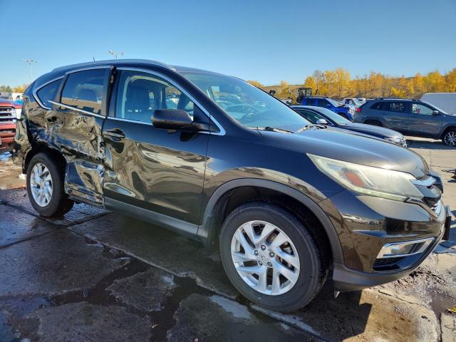 Photo 4 from auction – 2016 HONDA CR-V EXL with VIN 5J6RM4H70GL001737