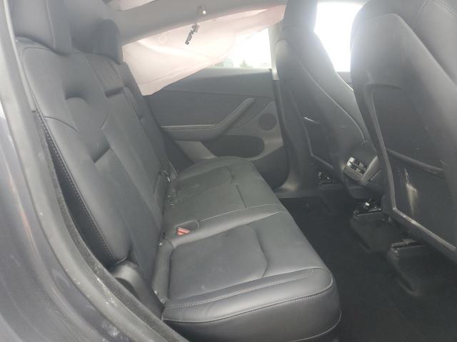 Photo 11 from auction – 2023 TESLA MODEL Y with VIN 7SAYGDED7PF959203