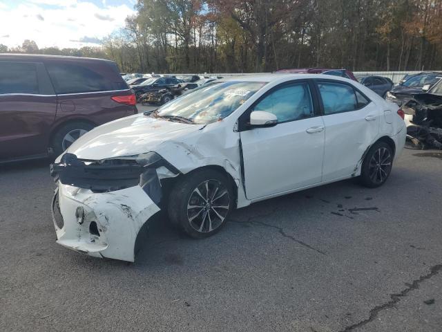 TOYOTA COROLLA L 2017 with VIN 5YFBURHE5HP727931 - Photo from auction