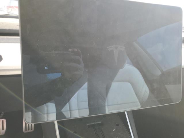 Photo 9 from auction – 2018 TESLA MODEL 3 with VIN 5YJ3E1EB4JF074247