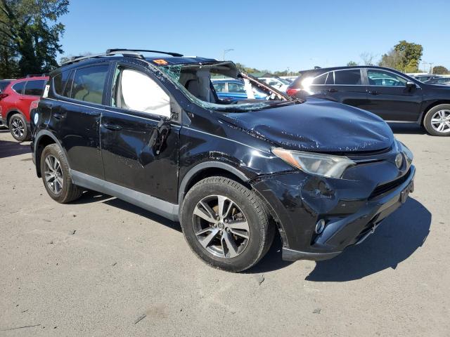 Photo 4 from auction – 2017 TOYOTA RAV4 XLE with VIN 2T3RFREV2HW614263
