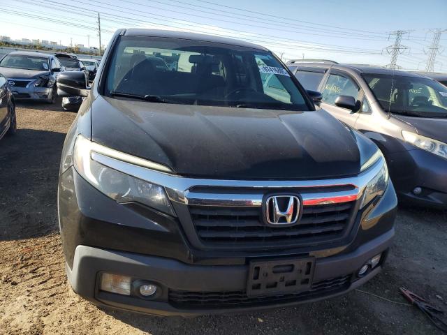 Photo 5 from auction – 2017 HONDA RIDGELINE with VIN 5FPYK3F61HB009479