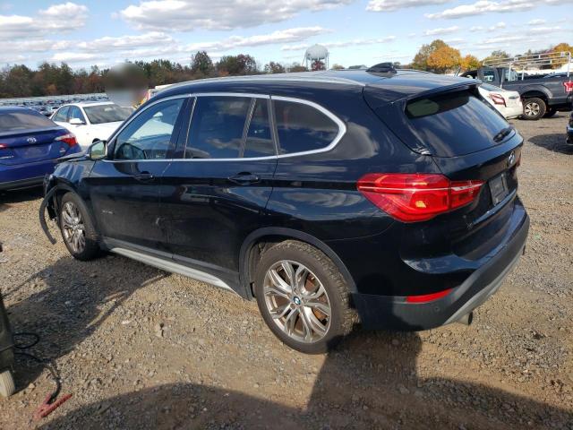 Photo 2 from auction – 2017 BMW X1 with VIN WBXHT3Z33H4A56940